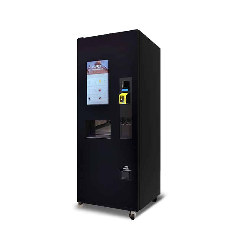 DVS_Joe2Go_-_Wrapped_No_Marquee_-_Web A vending machine that can vend coffee and other hot drinks. It has a touchscreen and is matte black metal