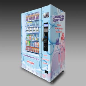 A vending machine with a vinyl wrap showing detergent bottles and bubbles with the text "Laundry Supplies"